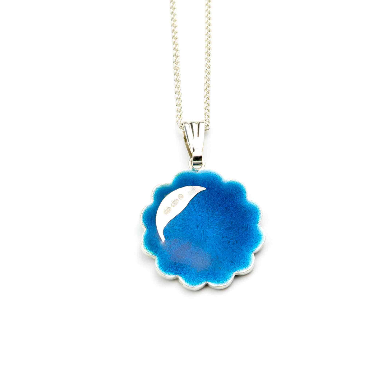 Back view of Persian Lotus Pendant handcrafted in sterling silver, showing the smooth silver finish and pendant construction.