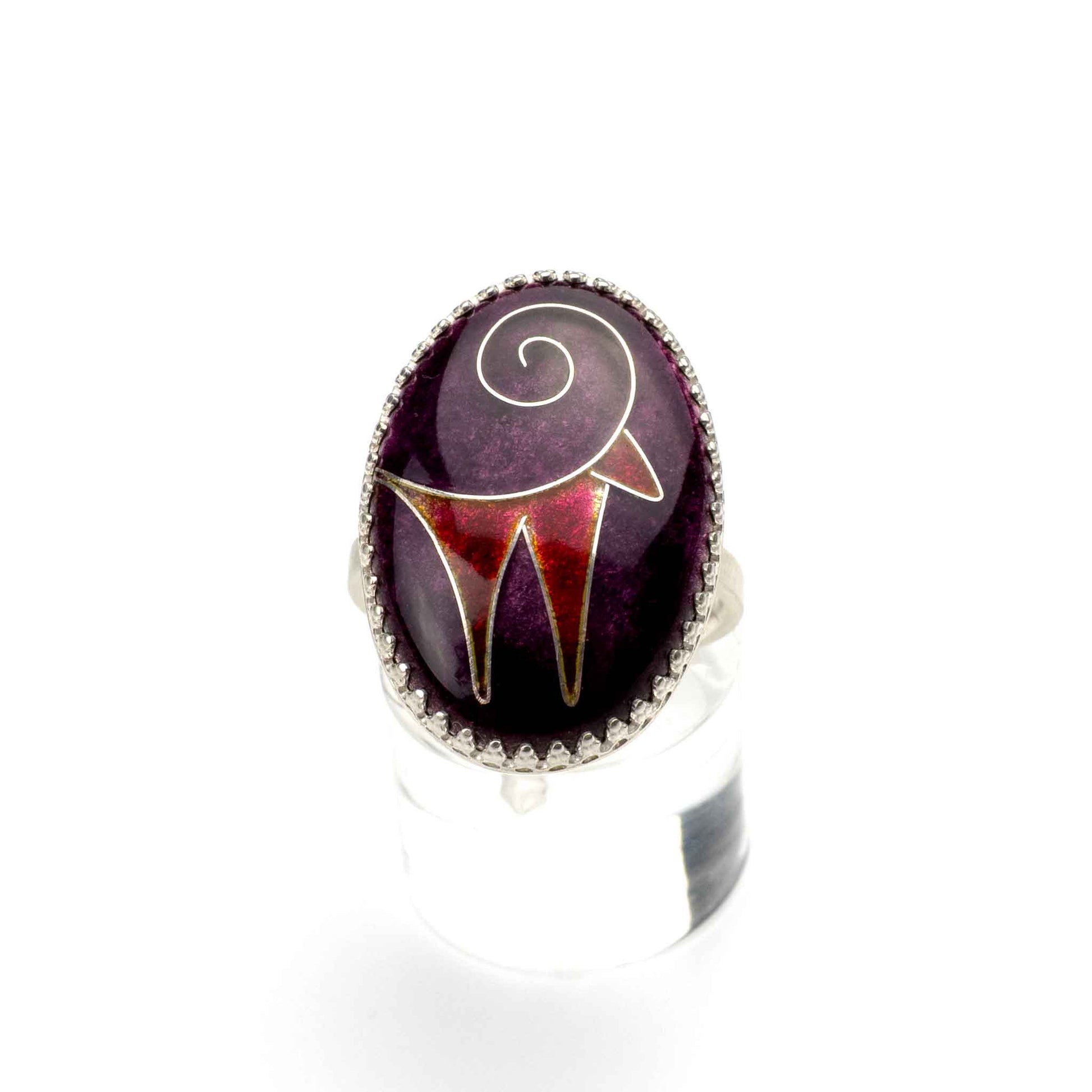 Zagros Spirit Ring handcrafted in sterling silver with kiln-fired vitreous enamel, featuring a rich purple background and deep red abstract mountain goat.