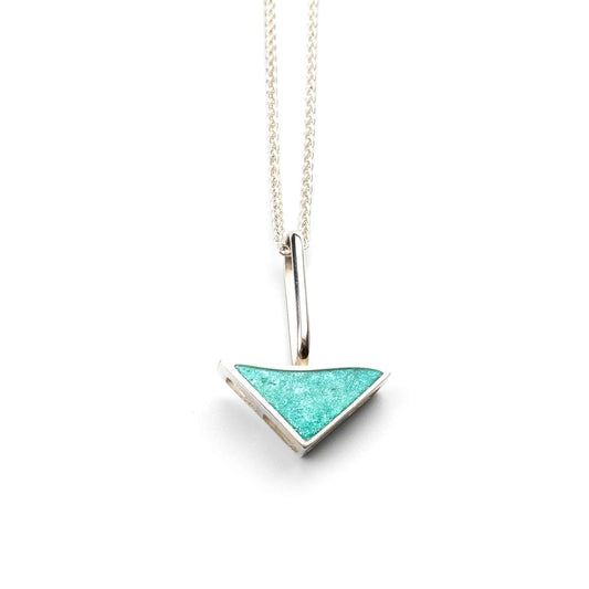 Ocean Whisper Pendant handcrafted in sterling silver with kiln-fired turquoise vitreous enamel, inspired by the movement and depth of the ocean.