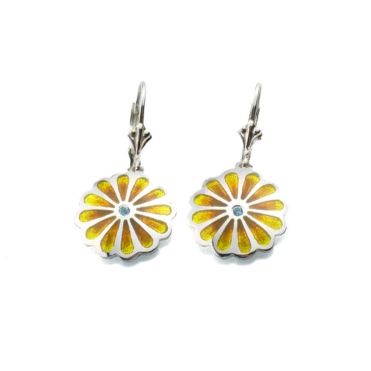 Handmade sterling silver Persian lotus drop earrings with warm yellow vitreous enamel and blue topaz on white background