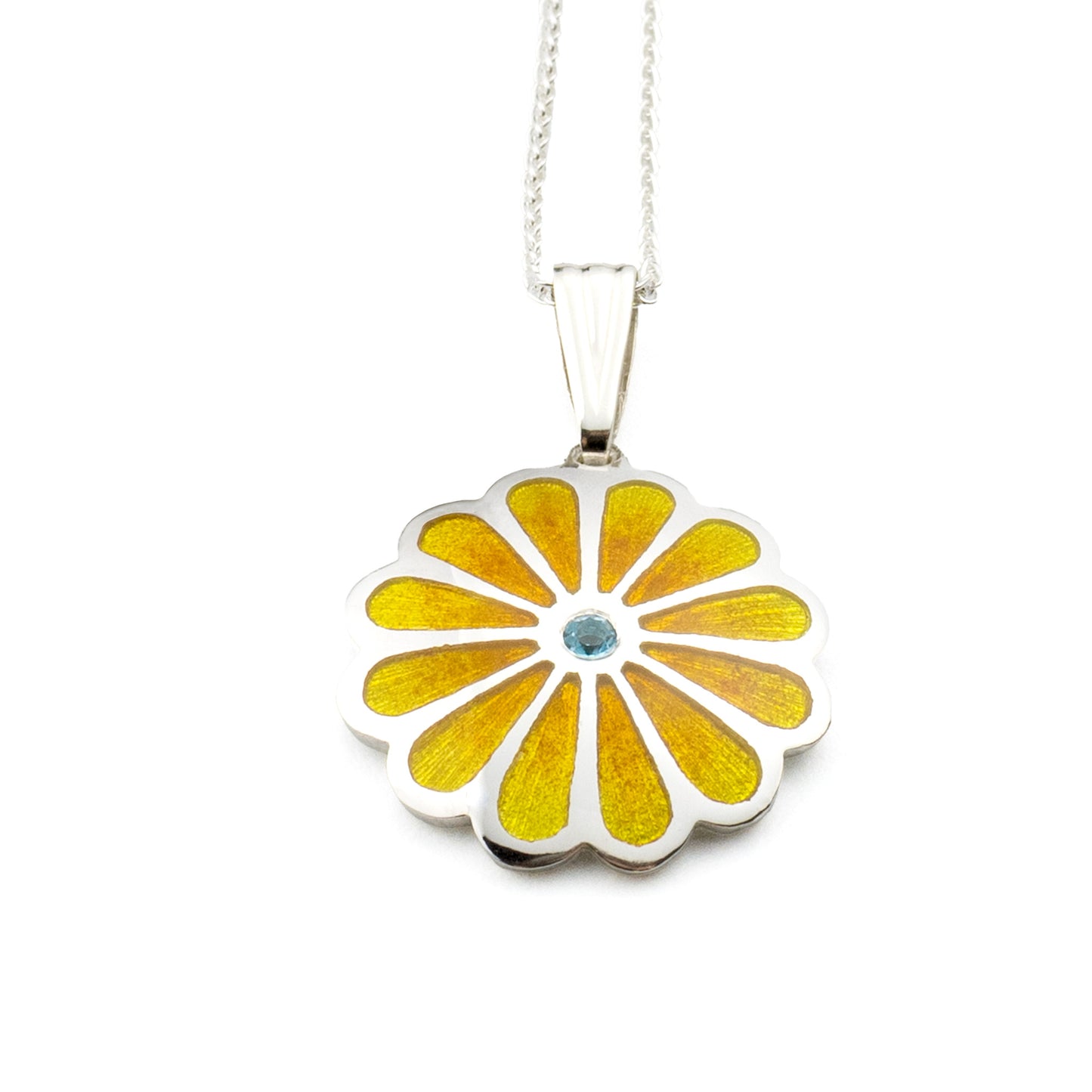 Handmade sterling silver Persian lotus pendant with layered warm yellow vitreous enamel and blue topaz on white background