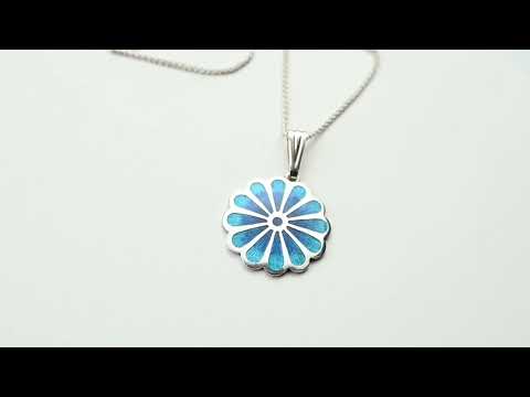 Close-up of Persian Lotus Pendant showing layered shades of blue vitreous enamel on sterling silver.