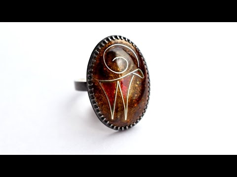 Detail of Zagros Spirit Ring in oxidized sterling silver with abstract mountain goat design from the Mountain Spirit Collection.