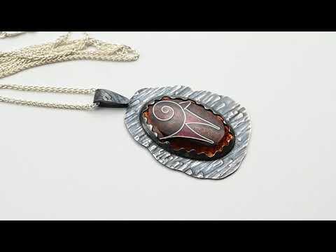 Handmade Zagros Spirit Pendant with oxidized silver background and vitreous enamel, inspired by Persian mountain landscapes.